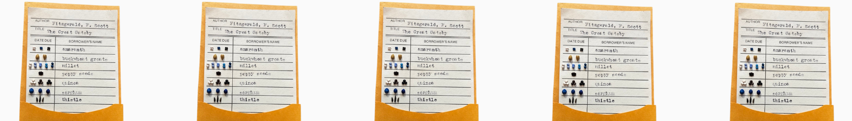 A a legend card identifying the various seeds used in a piece of crop art. The legend is stylized like an old-fashioned library checkout card.